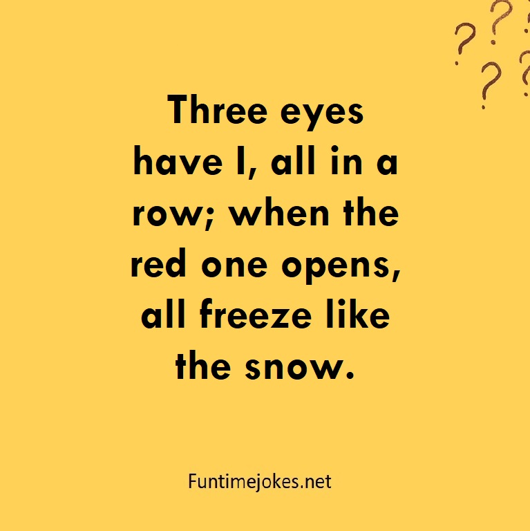 Three eyes have I, all in a row; when the red one opens, all freeze like the snow.